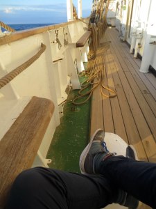 Sitting on the bits after flaking the fore-upper-tops'l halyard