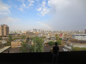 A brief break in the weather leaves a happy rainbow over soggy erbil